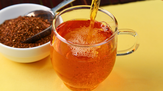 serving a cup of rooibos tea for skin