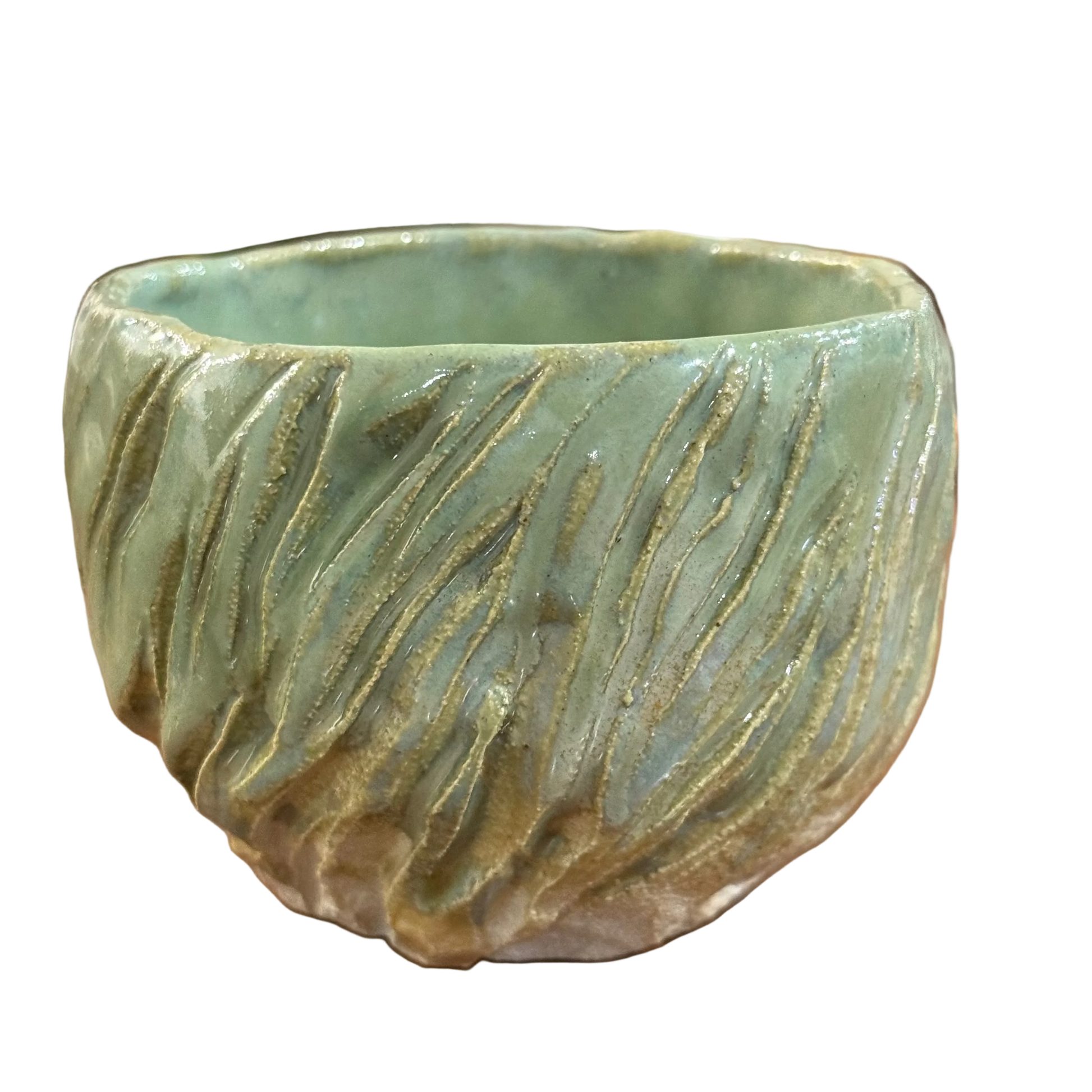 Green Ceramic Matcha bowl with textured surface on a white background